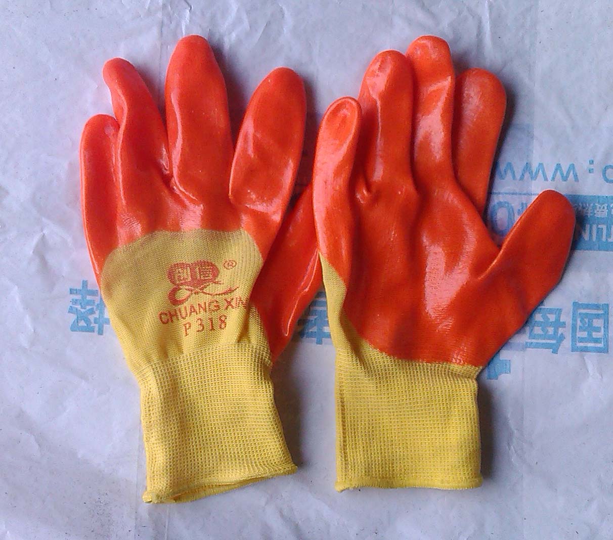 创信彩纱PVC半浸手套 保护双手的时尚之选